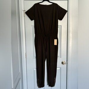 Albion Fit one piece jumpsuit. Black. Size Medium Tall. Brand new with tags